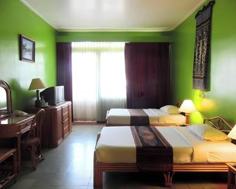 Smile Inn Hotel - ויינטיאן - חדר שינה