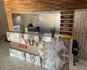 Hotel Grand Lpm - Theni - Front desk