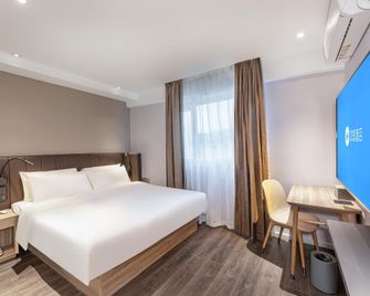 Hanting Hotel Nanjing Dachang Changchong Pedestrian Street - Nanjing - Bedroom