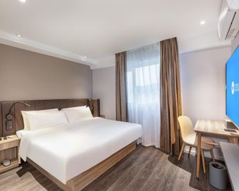 Hanting Hotel Nanjing Dachang Changchong Pedestrian Street - נאנז'ינג - חדר שינה