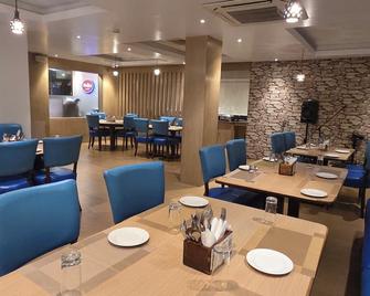 Hotel Gulmohar Grand - Jorhāt - Restaurante