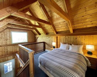 Best Coast Cabin - יוקלולט - חדר שינה
