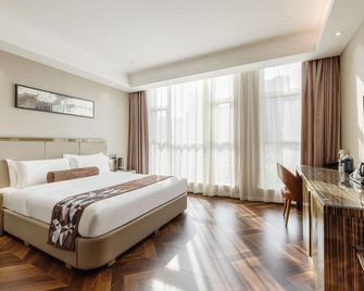 James Joyce Coffetel Tianjin Meijiang Convention And Exhibition Center - Tianjin - Bedroom