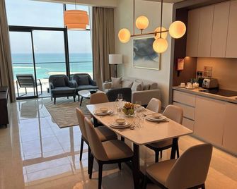 Luxury two-bedroom apartment at Address Bahrain. - Manama - Dining room