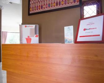 RedDoorz Syariah near Ngade Lake Ternate - Ternate - Front desk