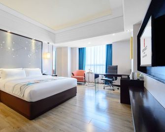 Foshan Rezen Select Pasonda Hotel - פושאן - חדר שינה