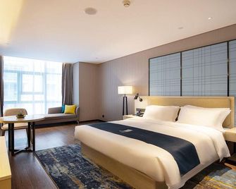 Echarm Hotel Jinzhai Wuxing Street Osmanthus Park - Lu’an - Bedroom