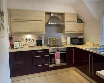 Skyefall, 5 River Court - sleeps 4 guests in 2 bedrooms - Invergarry - Cuisine