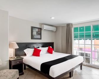 Boca Inn Hotel & Suites - בוקה דל ריו - חדר שינה