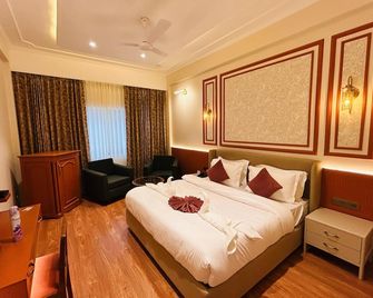 Hotel Kamal Palace - Jalandhar - Sovrum
