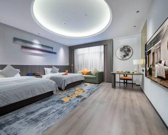 AI Stay Future Tang'an Hotel (Xi'an Longshou District Daming Palace West Subway Station) - Xi'an - Bedroom