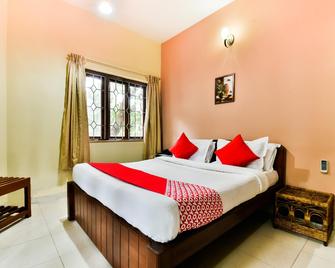 OYO Shooolin Homestay - Candolim - Phòng ngủ
