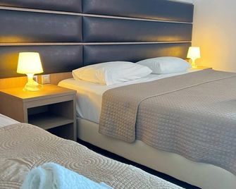 Thalassa Boutique Apartments - Sarti - Ložnice