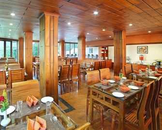 Elysium Gardens Hill Resorts - Munnar - Restaurante