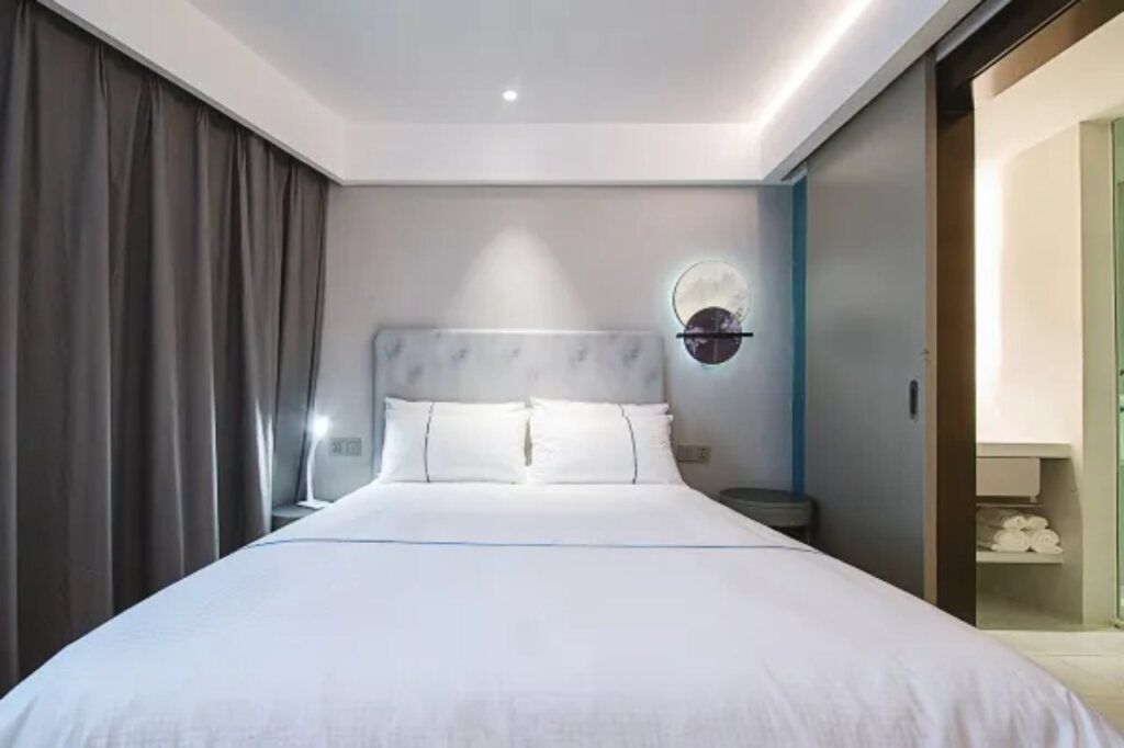 Magnotel Hotel Wuhan Jiangtan Lihuangpo Road Pedestrian Street - Wuhan - Soveværelse