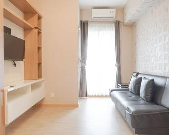 Cozy and Simply Look 2BR Apartment at M-Town Residence By Travelio - Tangerang City - Living room