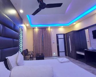 Rajani Residency - Mandarmani - Спальня