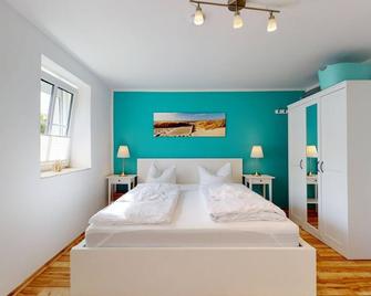 Beautiful apartment in the house Ginsterdün ground floor for max 4 p in top location on Langeoog - Langeoog - Yatak Odası