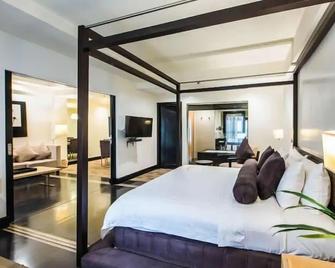 L'Fisher Ecotel - Bacolod - Ložnice
