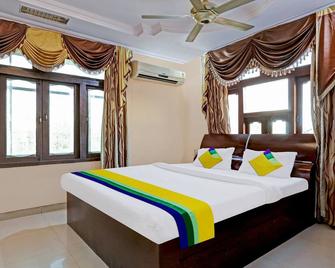 Itsy Hotels Friends - Rudrapur - Bedroom
