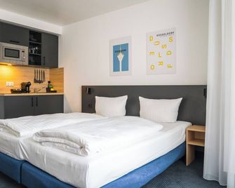 Apartments an der Kö - Düsseldorf - Schlafzimmer