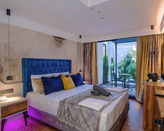 Ada Port Hotel Adults Only - אלניה - חדר שינה