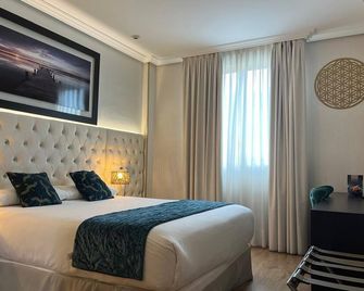 Hotel Suites Feria de Madrid - מדריד - חדר שינה