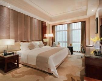 Winner Ambassador Hotel - Quanzhou - Bedroom
