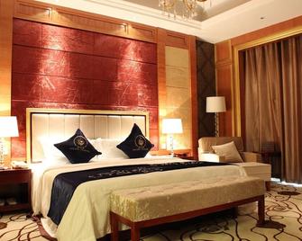 Golden Peacock Resort Hotel - Beira - Schlafzimmer