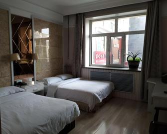 Hanting Hotel Mudanjiang Railway Station - Mudanjiang - Camera da letto