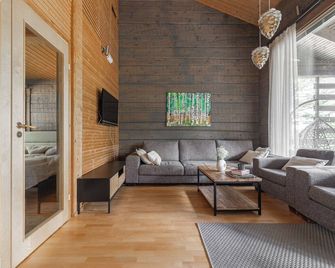 Villa Kultaranta A - Scenic Lakeside Cabin with Hot Tub and Sauna - Tahkovuori - Olohuone