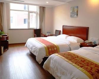 Greentree Tangshan Nanhu Jindi Business Hotel - 唐山（トウザン） - 寝室