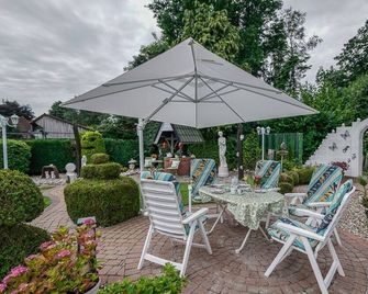 Ferienwohnung Schoon, 85042 - Ostrhauderfehn - Patio