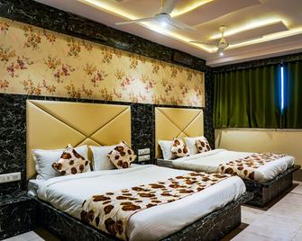 Hotel Privilege Villa - Ахмедабад - Спальня