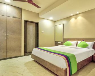 Treebo Sriz Cozy Seethamadhara - Вишакхапатнам - Спальня