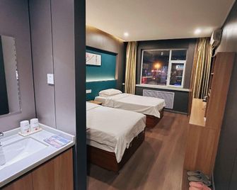 Yun Pan 777 Chain Hotel (Taiyuan Provincial Chinese Medicine Hospital) - Taiyuan - Schlafzimmer
