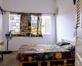 Chambres d'hôtes - Chez Mama Sêdjro - Porto Novo - Bedroom