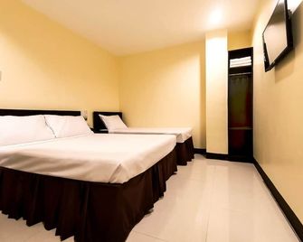 Winzelle Suites - Zamboanga City - Camera da letto