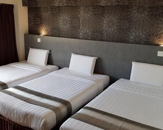 Check Inn Hotel Tawau - Tawau - Bedroom