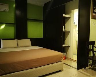Tropicana Inn - Sitiawan - Schlafzimmer