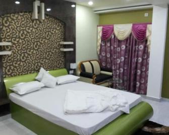 Hotel Ridhi Sidhi and Restaurant - Alīpur Duār - Bedroom