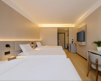 Thank Hotel Shandong Yantai Yingchun Street International Exhibition Center - Yantai - Soverom