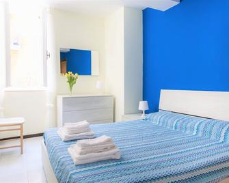 Centro Storico Oltretorrente Apartment - Parma - Bedroom