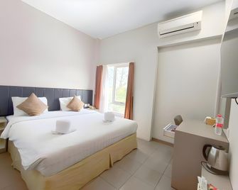 Splash Hotel - Bengkulu City - Camera da letto