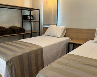Villaggio Rosa Hotel & Eventos - Arujá - Спальня