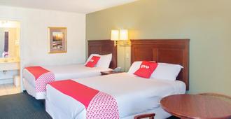 Rest Inn - Extended Stay, I-40 Airport, Wedding & Event Center - Amarillo - Bedroom