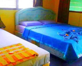Sukau Backpackers Bed & Breakfast - Sukau