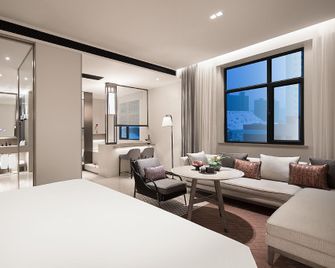 Manxin Hotel Urumqi Hongguangshan Convention And Exhibition Center - Ürümqi - Habitación