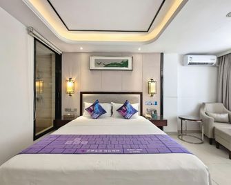 Jiajie Boutique Hotel (Haikou East High-speed Railway Station) - Haikou - Slaapkamer