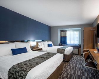 Microtel Inn & Suites by Wyndham Burlington - Burlington - Schlafzimmer